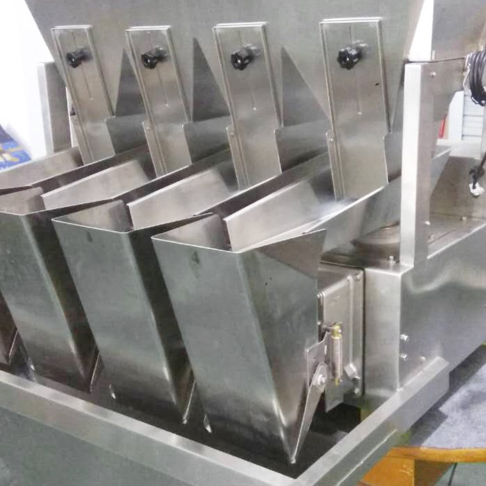 Automatic quantitative weighing rice grain granule flour agent feed organic fertilizer sealing and packing machine