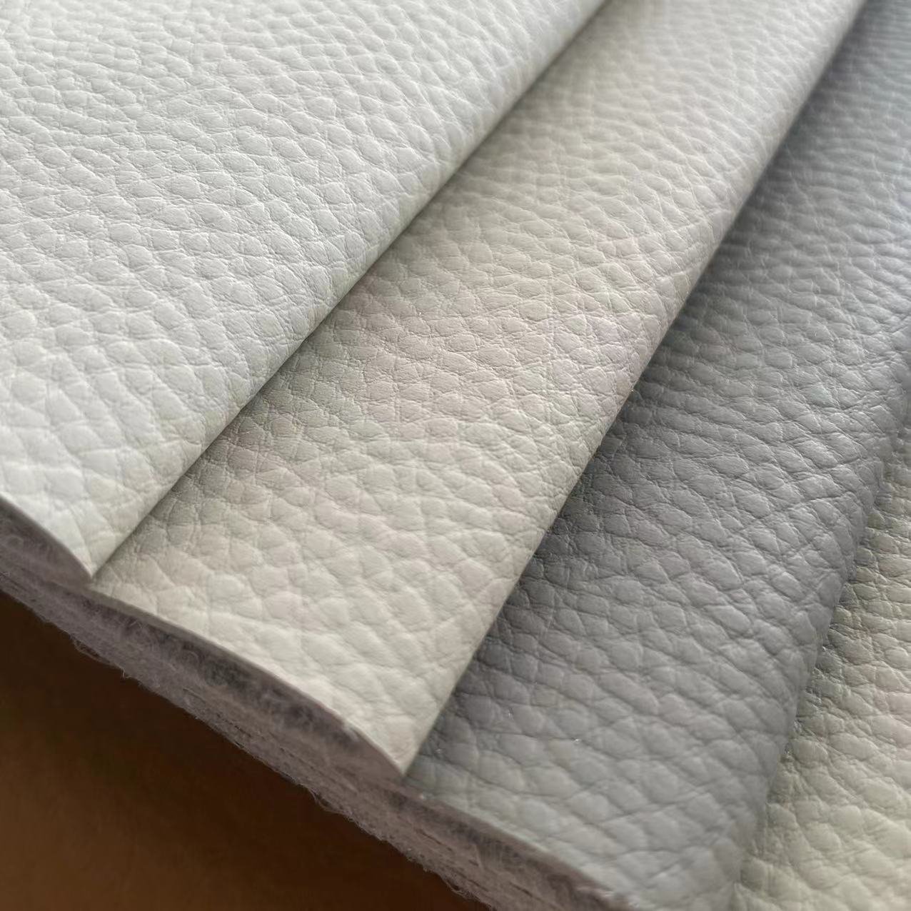 cheap price PVC vinyl faux leather fabric for pillow, bed, chair, seat cover