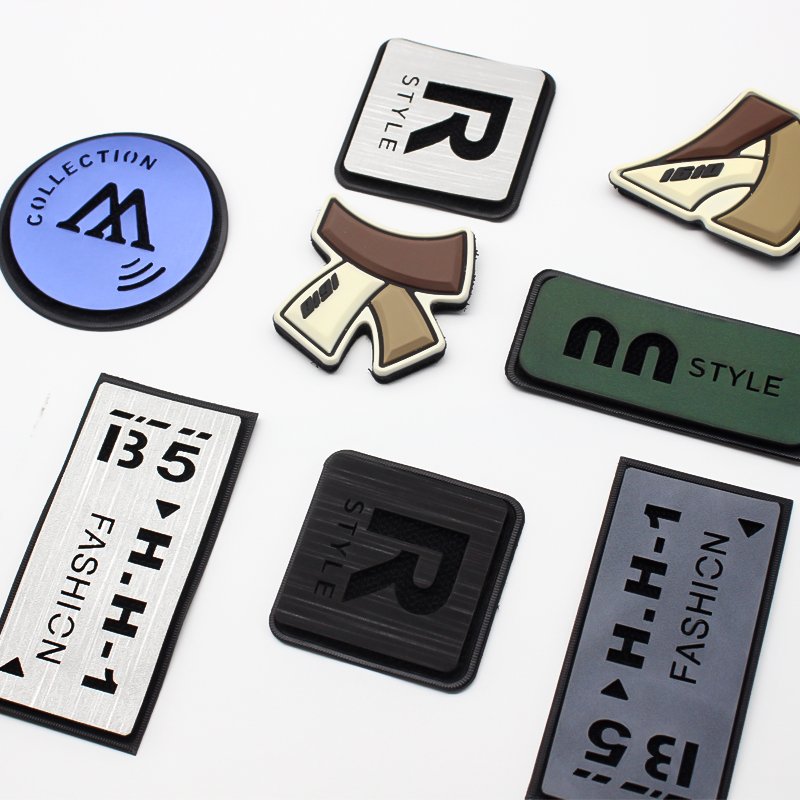 Custom embossed 3d raise logo style oem brand artwork pvc rubber badge cartoon patches for clothing