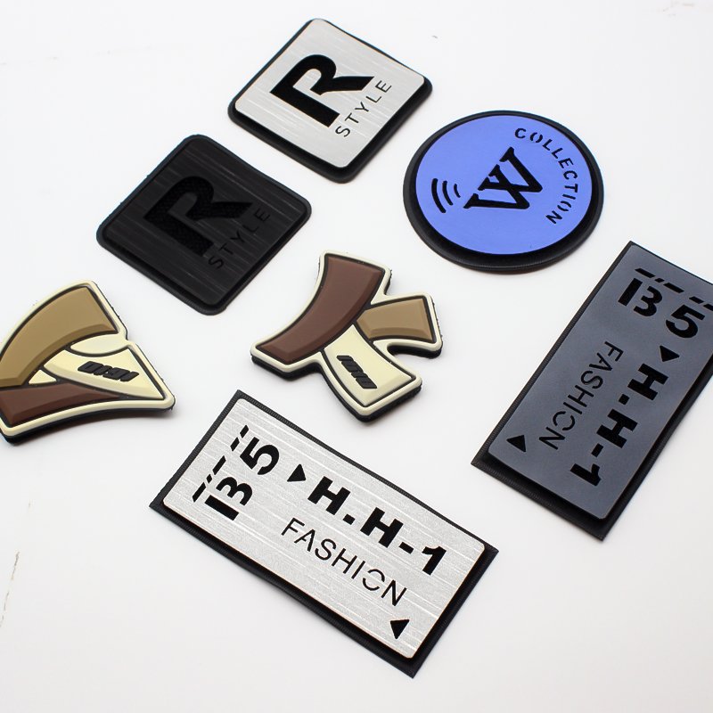 Custom embossed 3d raise logo style oem brand artwork pvc rubber badge cartoon patches for clothing