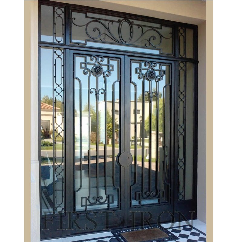 Custom arched double main entrance front entry wrought iron door