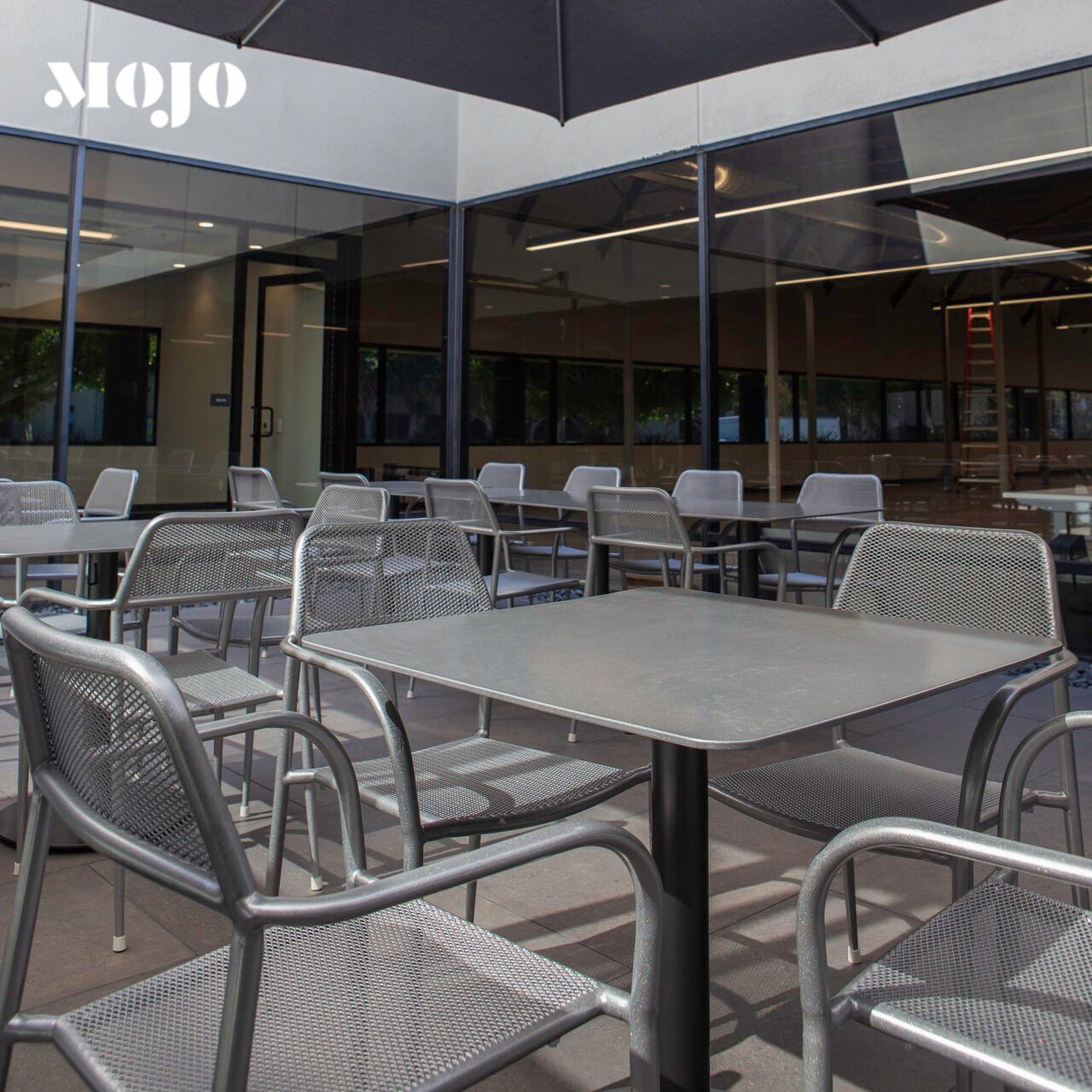 Industrial restaurant cafe chairs and coffee tables outside metal steel frame restaurant chairs