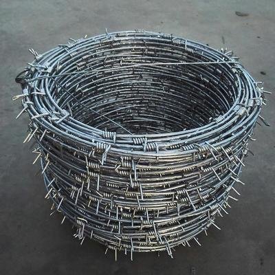14 Gauge Galvanized Iron Wire PVC Coated Barbed Wire Coil With Cross Razor Available In 0.8mm 2mm 2.5mm 5mm 8mm Diameters