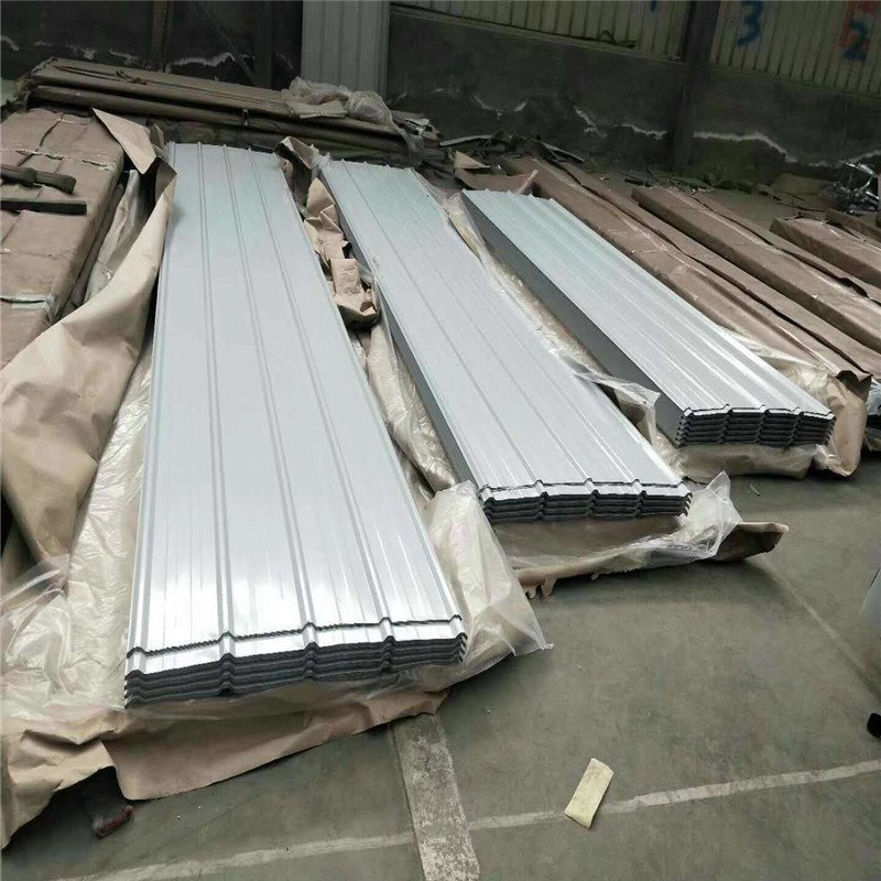 0.35mm 0.45mm Q235 SS400 building material color coated corrugated ppgi steel coil ppgl roofing sheets