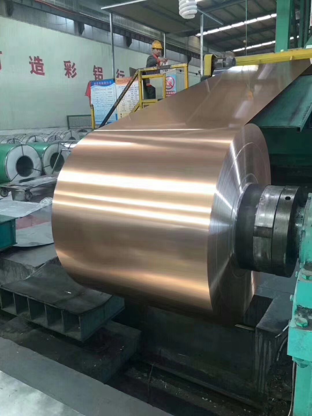 Factory produces PPGI color coated and pre-painted steel coil products, custom colored metal roofing sheet building materials