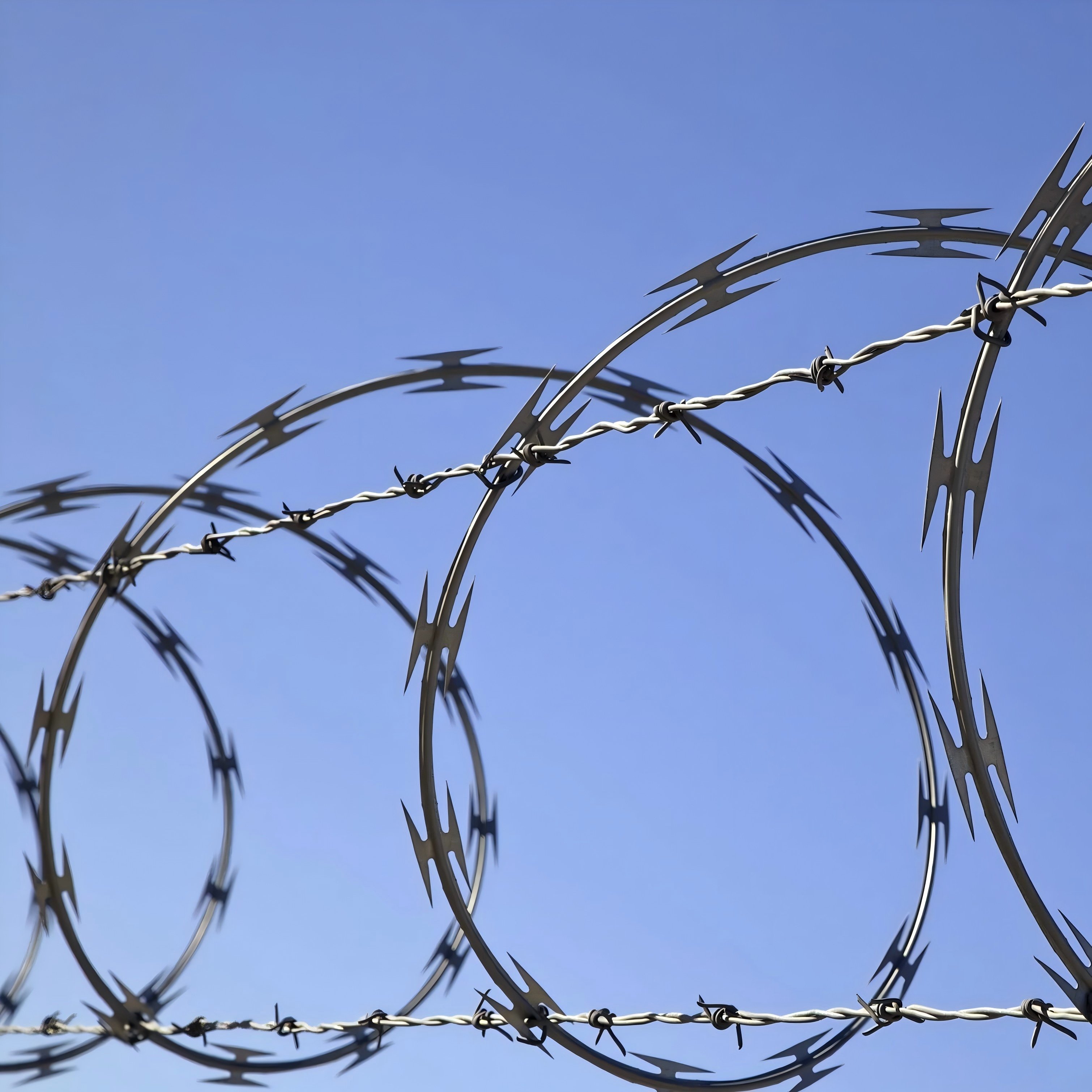 Low price hot dip galvanized razor barbed wire barbed wire coil anti-climb razor wire for pakistan