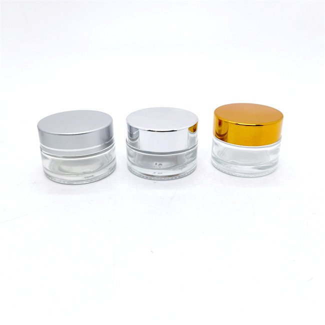 Custom wholesale 30g 50g 40ml 100ml 120ml clear cosmetic glass bottle sets glass jar with silver galvanized screw cap