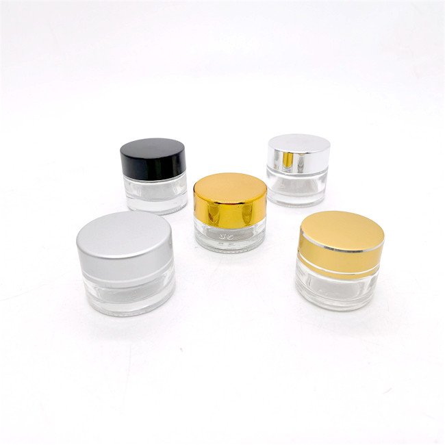 Custom wholesale 30g 50g 40ml 100ml 120ml clear cosmetic glass bottle sets glass jar with silver galvanized screw cap