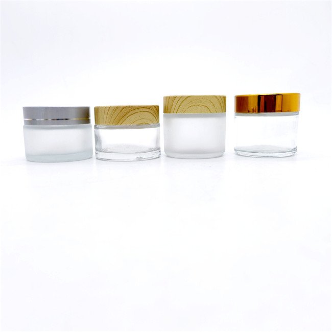 Custom wholesale 30g 50g 40ml 100ml 120ml clear cosmetic glass bottle sets glass jar with silver galvanized screw cap