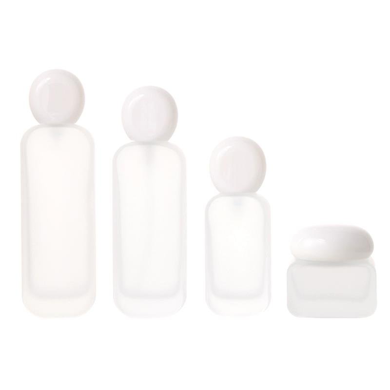 Customized Cosmetic frosted bottle transparent spray glass bottles Glass 100ml Cream bottle with stone lid