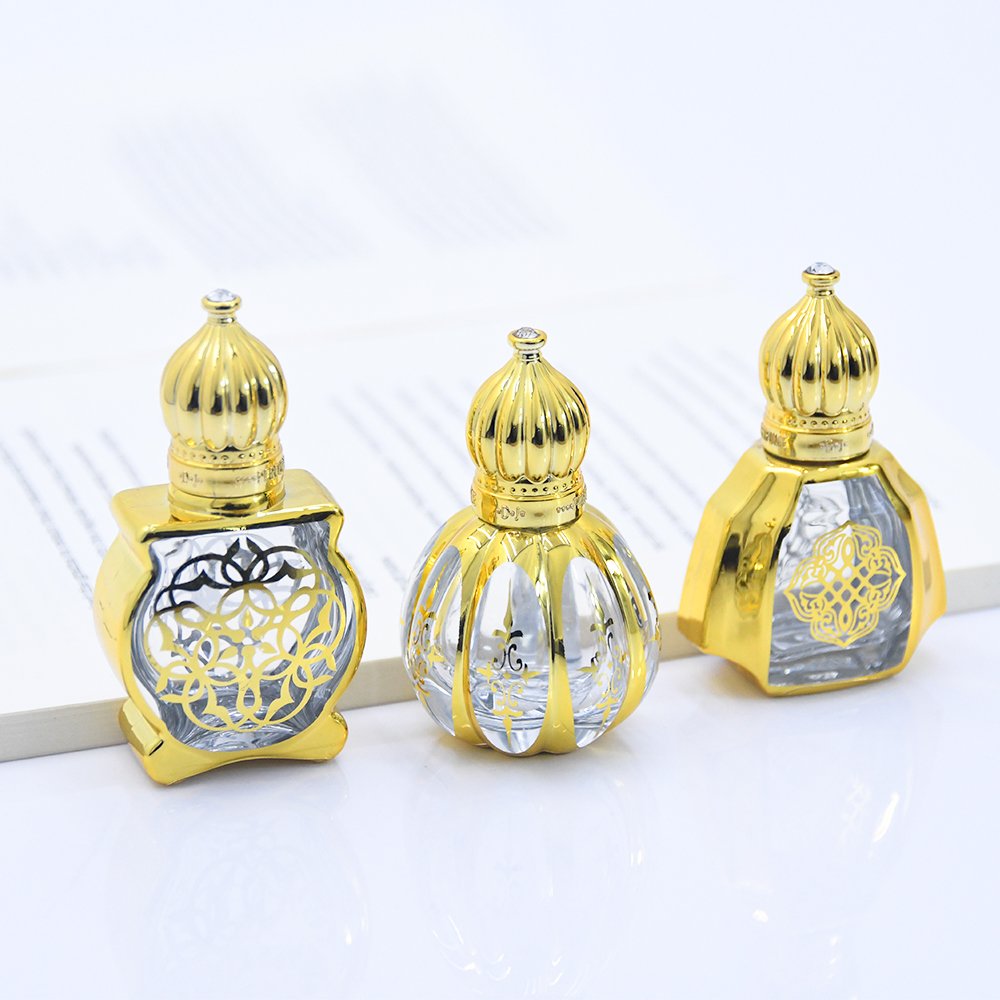 Fancy gold hot stamping attar roll on glass bottle 12ml refillable special golden glass perfume bottle with roller and dome lid