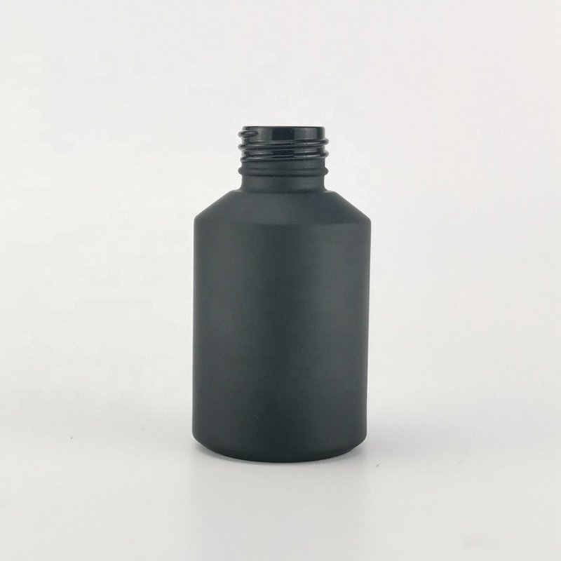 sloping shoulder glass bottle 60 ml matte black glass bottle 2 oz black frosted glass bottle with bamboo screw lid for cosmetic