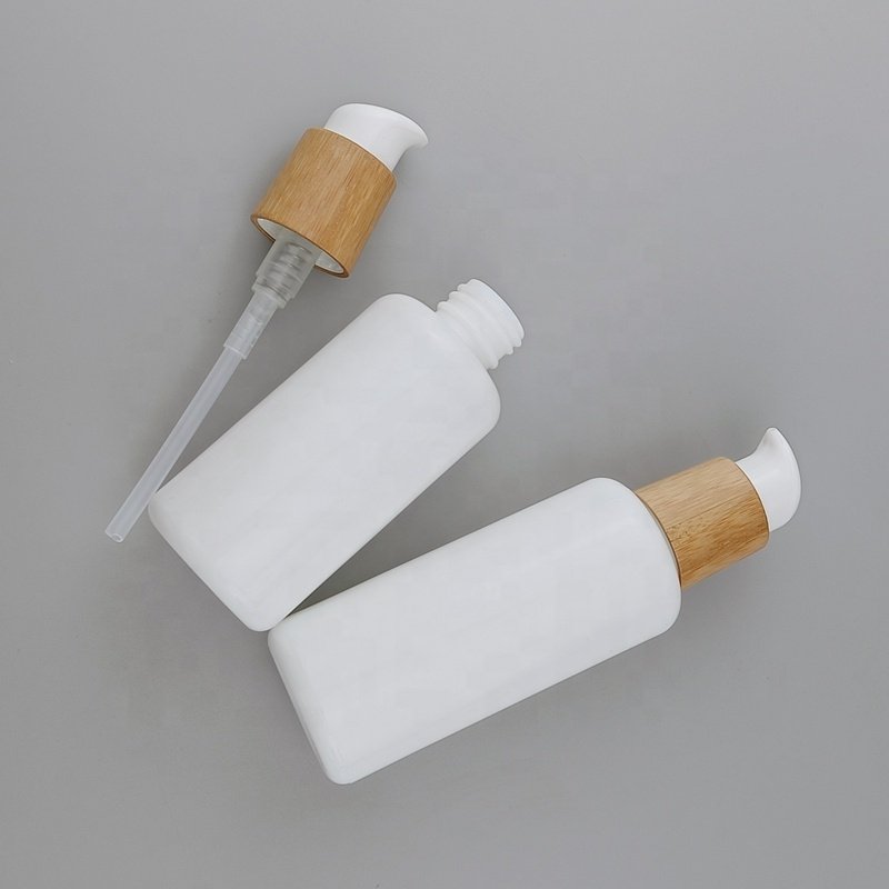 cosmetic opal glass bottle 40 ml 100 ml 120 ml 200 ml white glass bottle serum pump bottle and 50 ml glass jar with bamboo lid