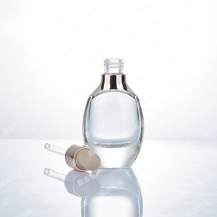 Custom luxury unique custom transparent skin care cosmetics glass bottle with dropper 15ml 30ml 50ml 100ml