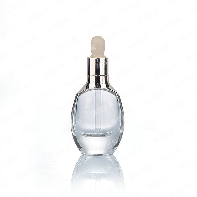 Custom luxury unique custom transparent skin care cosmetics glass bottle with dropper 15ml 30ml 50ml 100ml