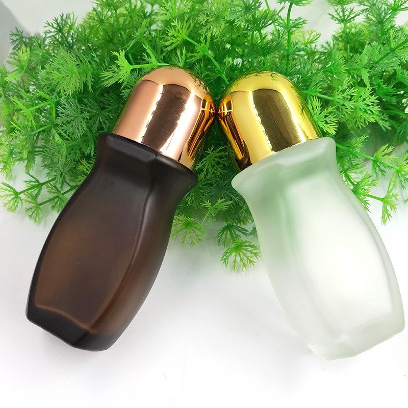 Custom-made frosted roll on bottles 30ml perfume oil roll on glass bottle with roller ball black or gold cap bottle roll on 50ml