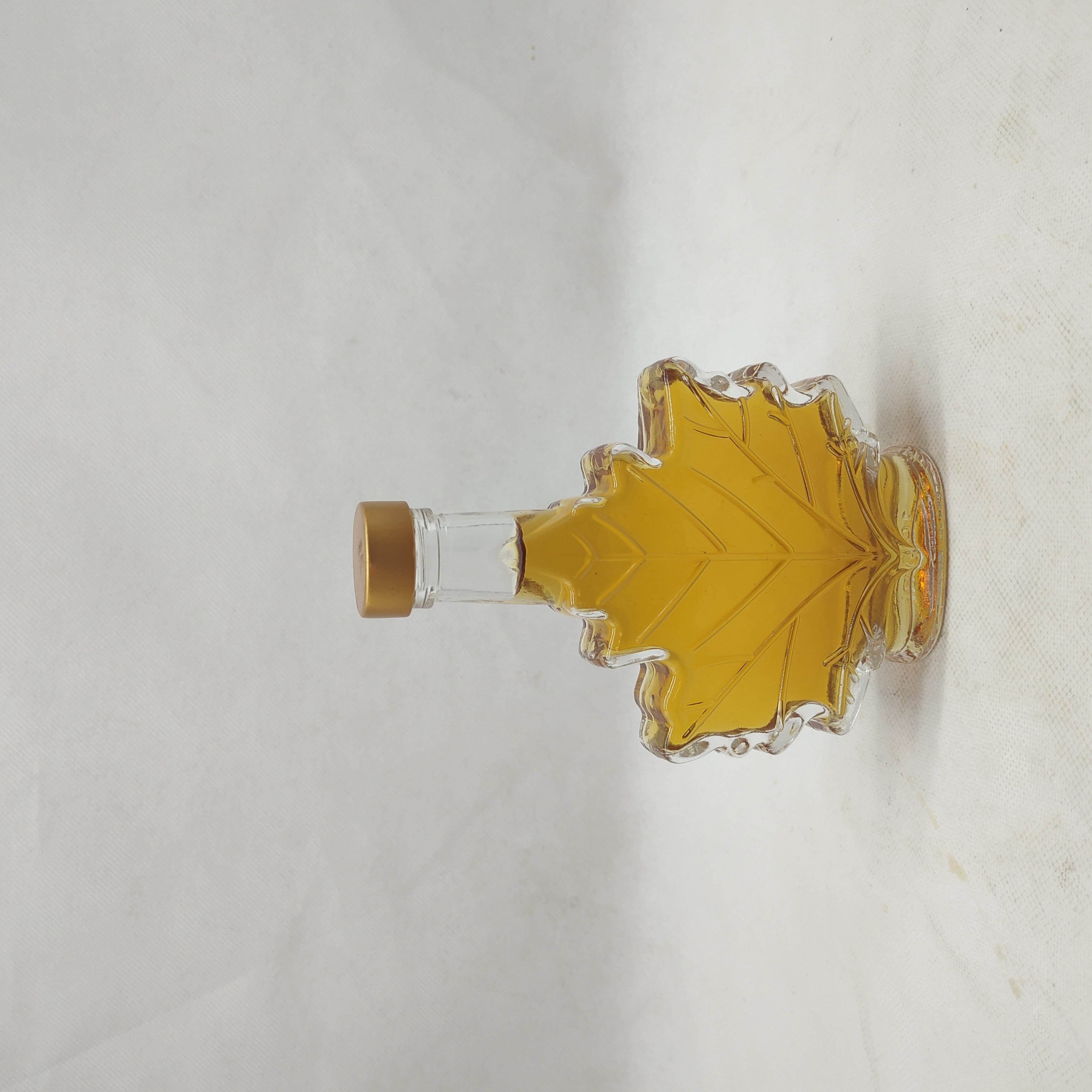 Wholesale Maple Shaped 50ml 100ml 250ml Syrup Drinks Beverage Gin Rum Liquor Wine Glass Bottles