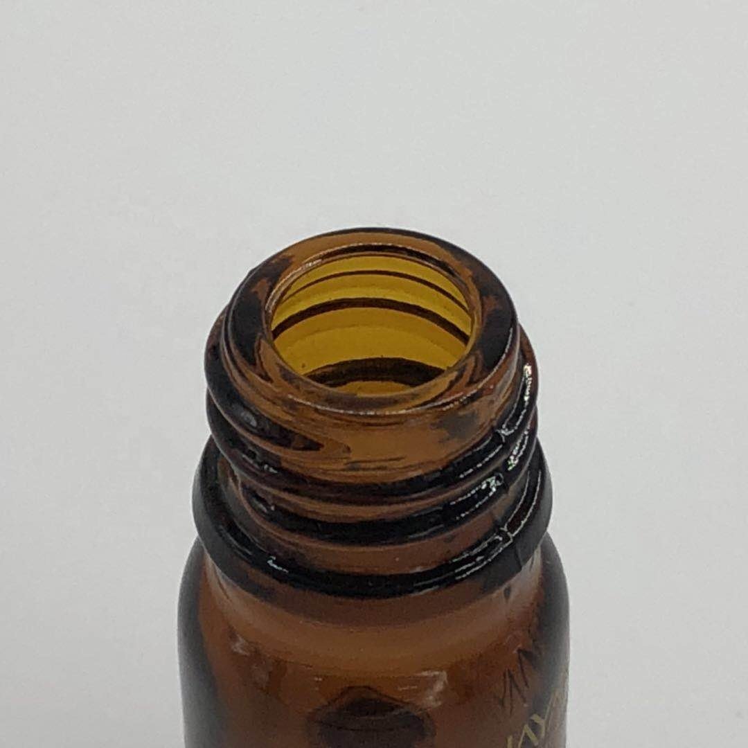 Manufacturers stock 5ml drop stopper essential oil bottle for skin care, amber glass bottle, screen printing