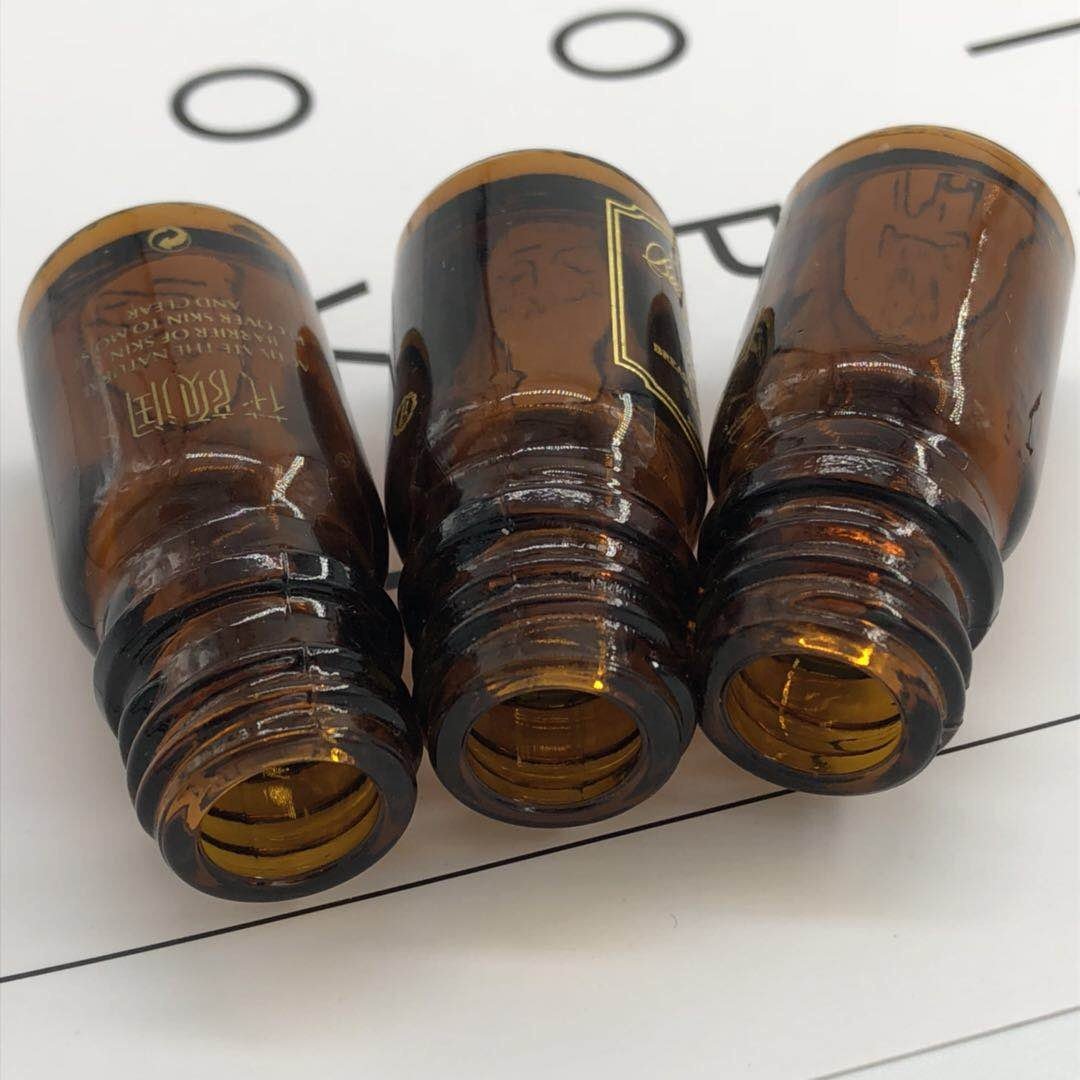 Manufacturers stock 5ml drop stopper essential oil bottle for skin care, amber glass bottle, screen printing