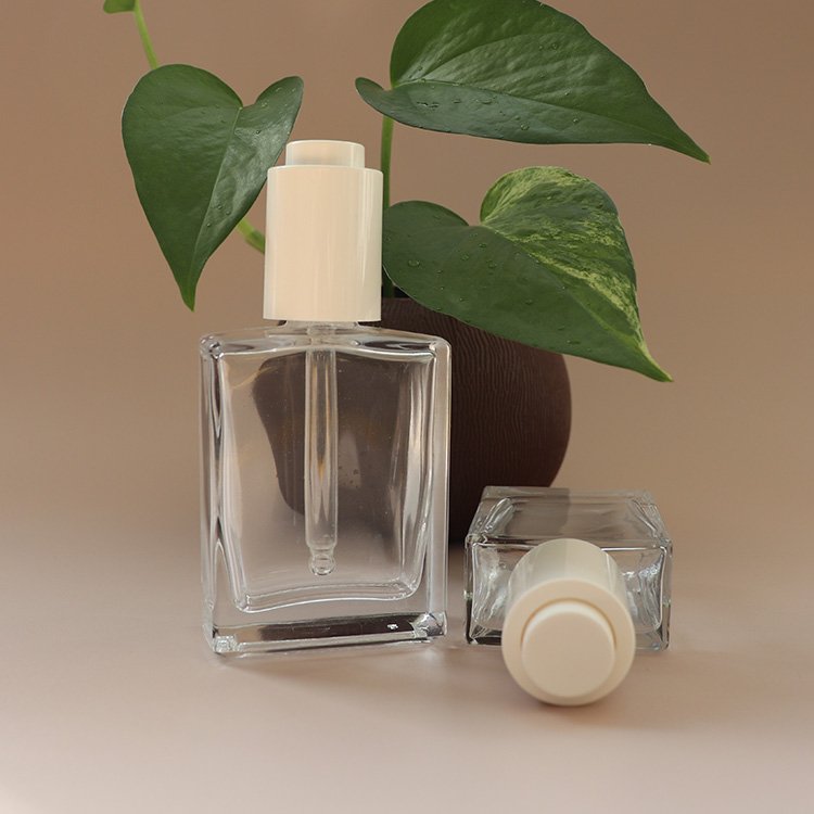 30 ml and 50 ml clear square glass bottle with white press essential oil dropper