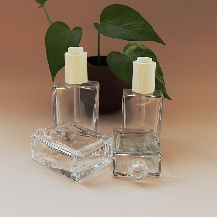30 ml and 50 ml clear square glass bottle with white press essential oil dropper