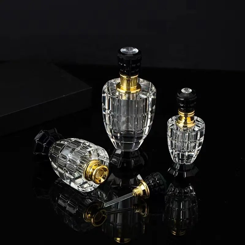 Manufacturers wholesale crystal glass bottles Atar oil crystal bottles with black crystal lid