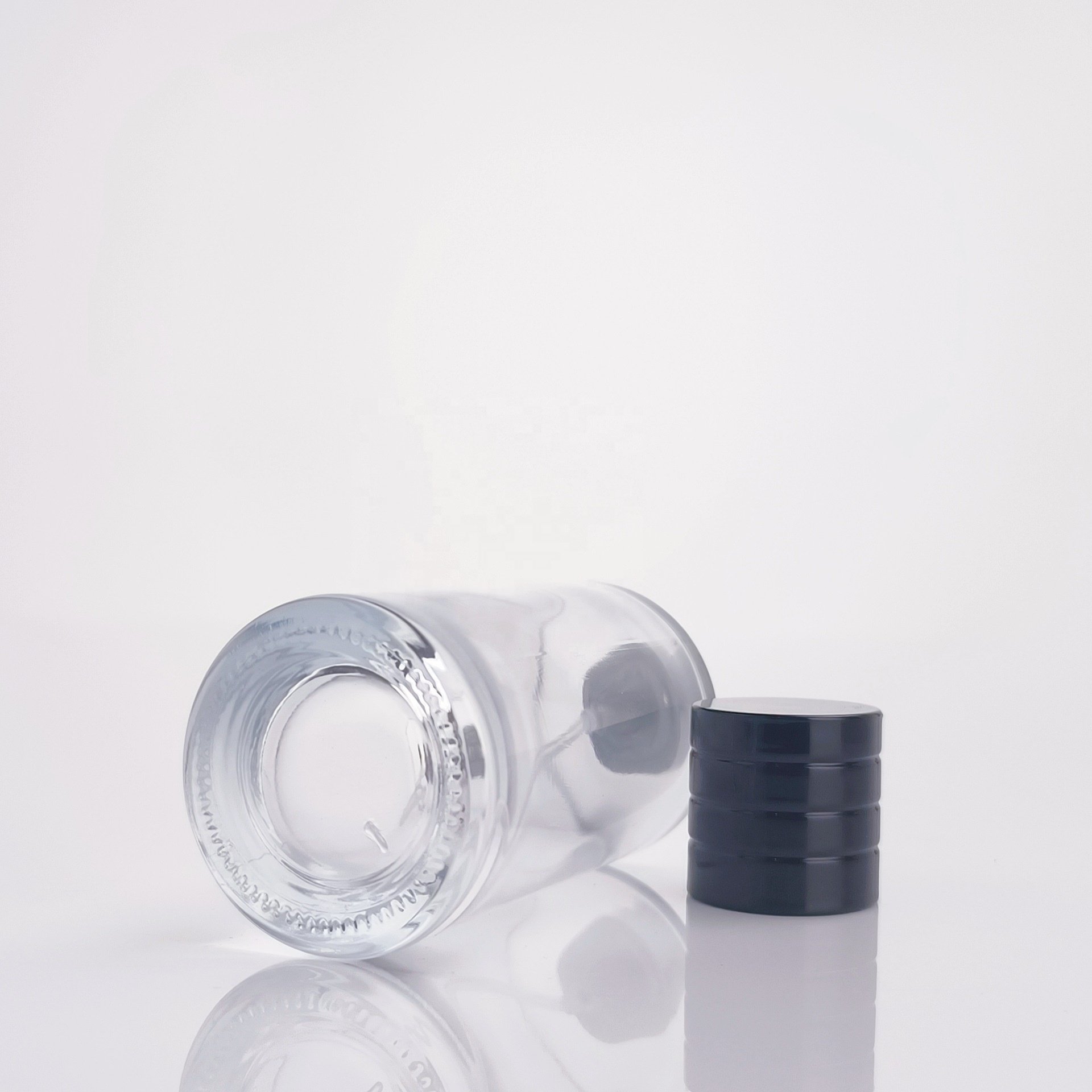 Glass perfume bottles 25ml 50ml 100ml wholesale luxury round transparent empty oil glass spray bottle with sprayer atomizer