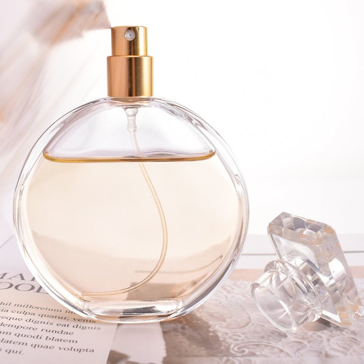 New original flat round shape custom 50ml 100ml empty perfume spray glass bottle for cosmetic essence for men