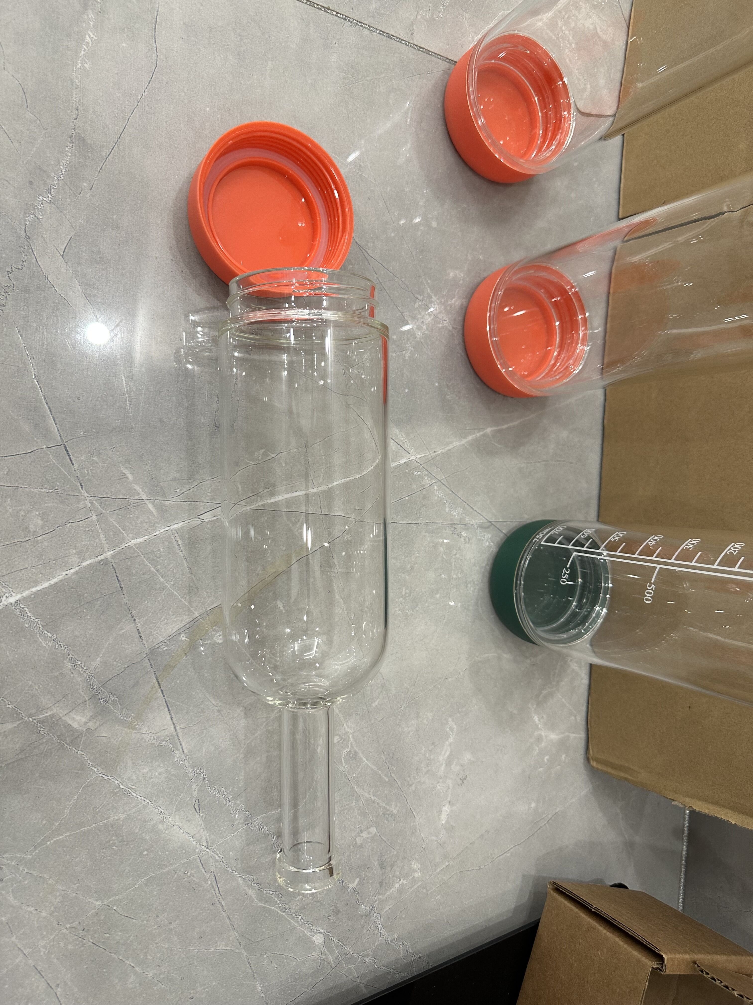 850ml glass bottle and outfitting with a rubberized, removable base