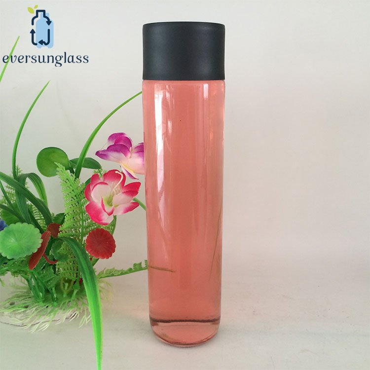 High quality 250ml 500ml 800ml cylinder round mineral water voss glass bottle with plastic screw lid wholesale