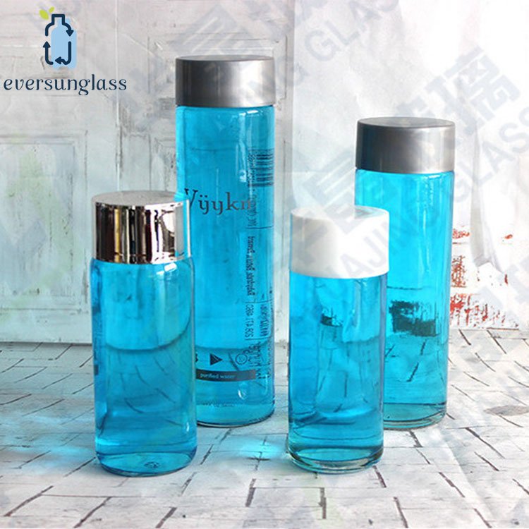 High quality 250ml 500ml 800ml cylinder round mineral water voss glass bottle with plastic screw lid wholesale