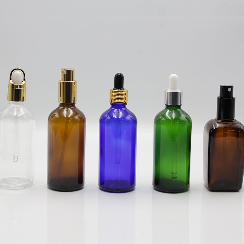 cosmetic glass bottle Colorful Customized Empty 50ml Cosmetic Oil Glass Bottle with Screw Cap Dropper for Skin Care Packaging