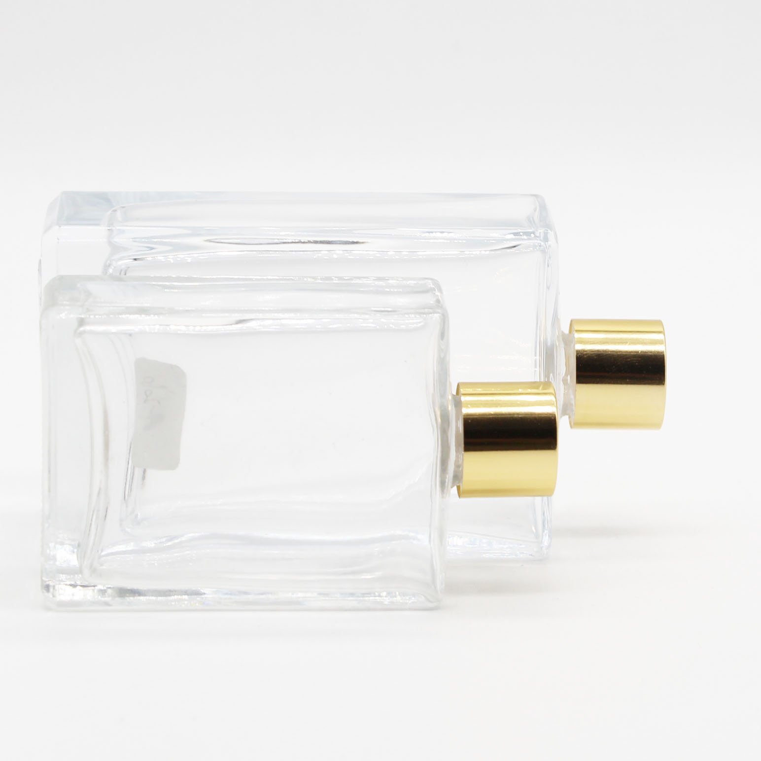 Hot sale 10ml 15ml 20ml 30ml 50ml luxury square glass transparent perfume bottle with pump cap screw cap