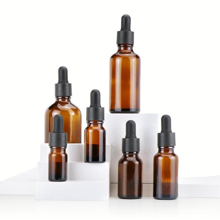 Top quality 15ml 20ml 30ml 50ml 100ml amber brown round shape cosmetic essential oil glass bottles with glass dropper