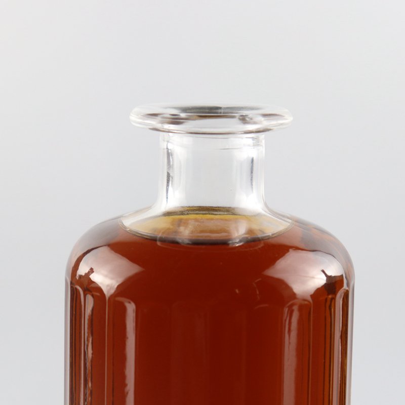 new fancy beautiful light unique shaped empty liquor glass bottle with golden lid