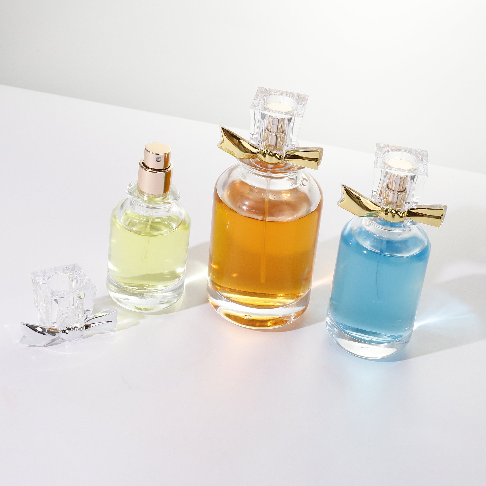 Elegant bow clear glass perfume bottle 30ml 50ml 100ml perfume bayonet spray bottle