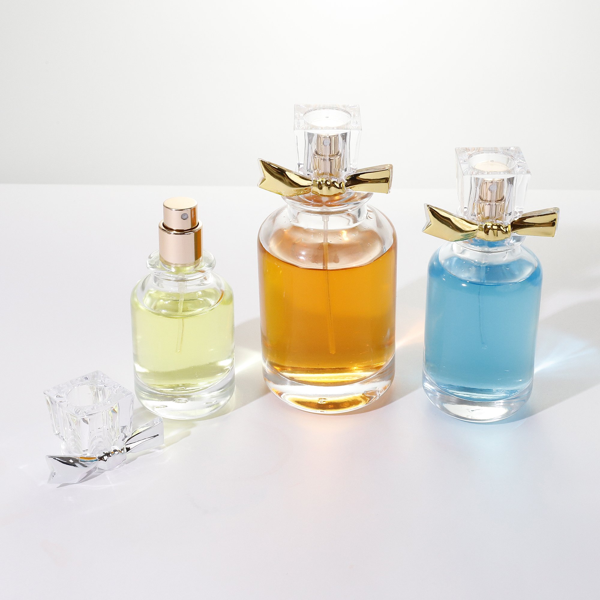 Elegant bow clear glass perfume bottle 30ml 50ml 100ml perfume bayonet spray bottle