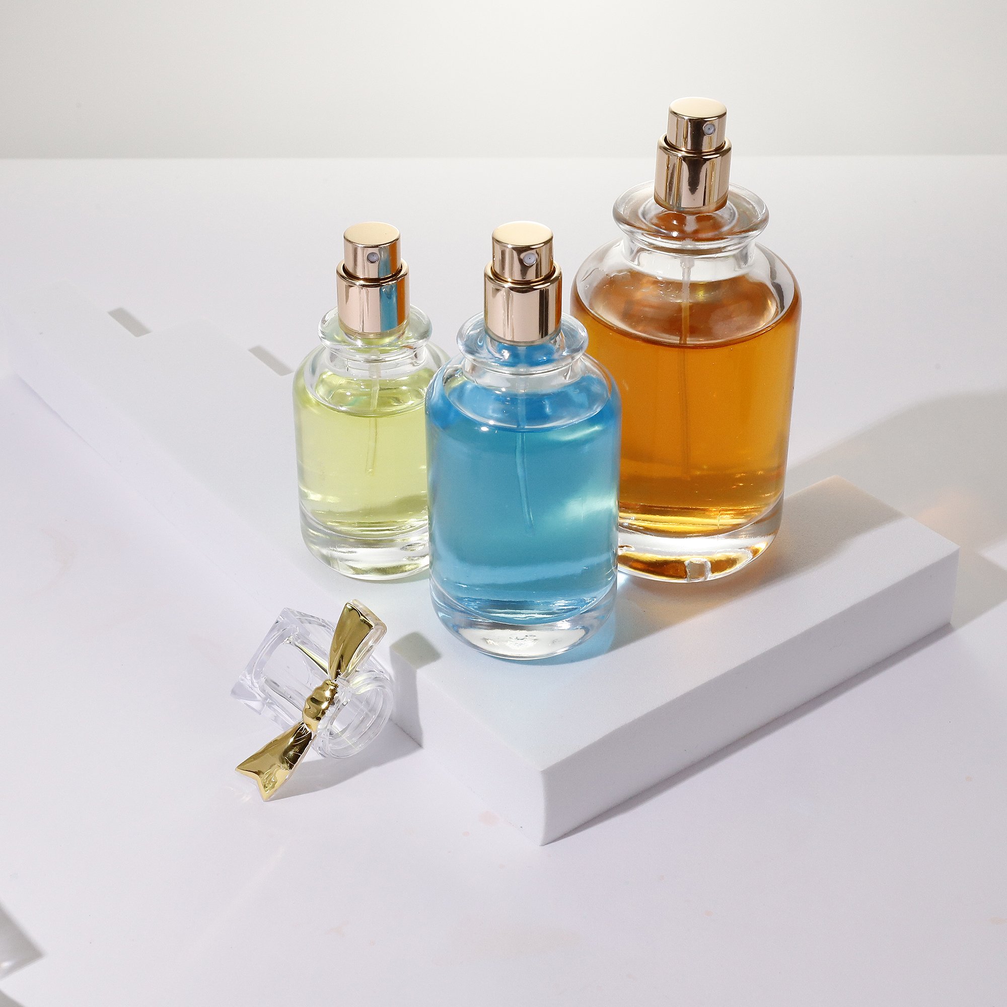 Elegant bow clear glass perfume bottle 30ml 50ml 100ml perfume bayonet spray bottle