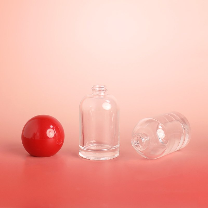 Customizable 30ml thick bottomed glass emulsion bottle with round cap pump head press bottle