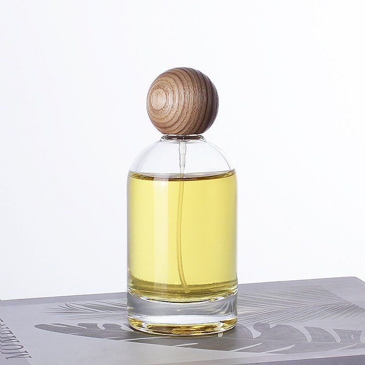 Wholesale 30ml 50ml 100ml Clear Glass Perfume Divided Bottle Spray Bottle Empty Perfume Bottle with Round Ball Cap