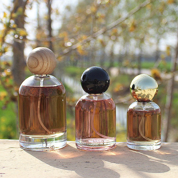 Wholesale 30ml 50ml 100ml Clear Glass Perfume Divided Bottle Spray Bottle Empty Perfume Bottle with Round Ball Cap