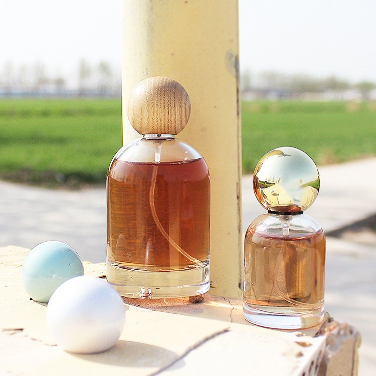 Wholesale 30ml 50ml 100ml Clear Glass Perfume Divided Bottle Spray Bottle Empty Perfume Bottle with Round Ball Cap