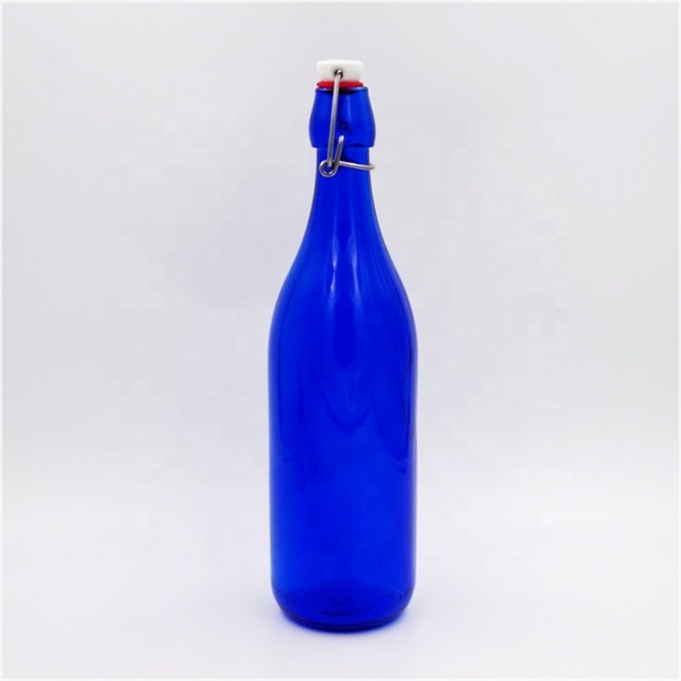 Hot sale 32oz cobalt blue round glass bottle aerated water glass bottle with clip top for beer liquor juice beverage