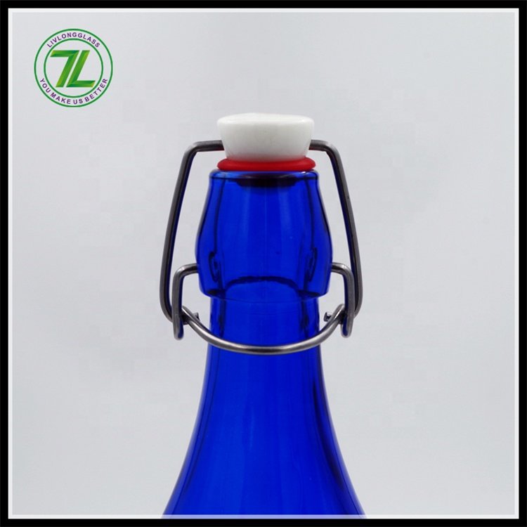 Hot sale 32oz cobalt blue round glass bottle aerated water glass bottle with clip top for beer liquor juice beverage