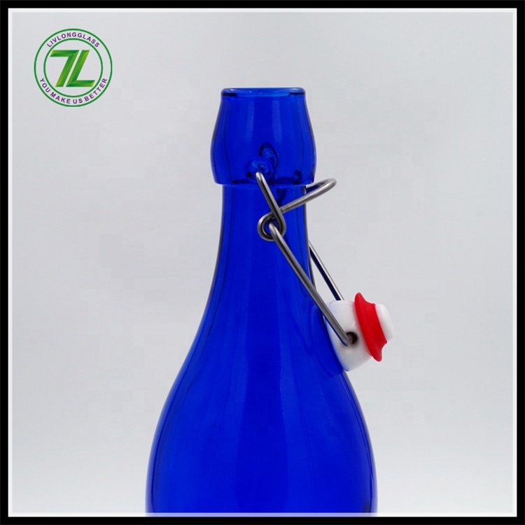 Hot sale 32oz cobalt blue round glass bottle aerated water glass bottle with clip top for beer liquor juice beverage
