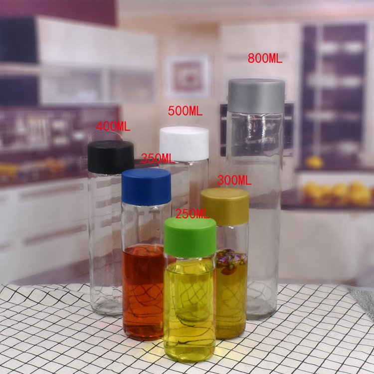 Glass Bottle Juice 250ml 300ml 400ml 500ml 750ml Glass Water Bottle for Cold Pressed Juice with Screw Lid