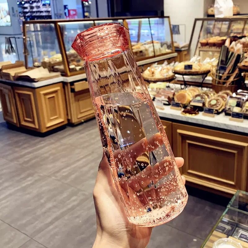 Crystal Infused Gem Water Bottle Wellness 500ml Glass water bottle wholesale Coloured stone glass water bottle