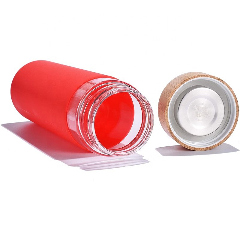 Eco Friendly 20 Oz BPA Free Borosilicate Glass Sublimation Glass Bottle with Bamboo Lid and Silicone Sleeve