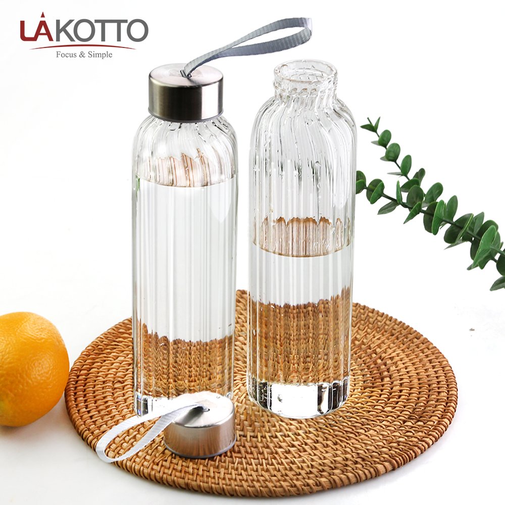 Custom logo wholesale luxury premium reusable borosilicate drinking glass water bottles with seal lid