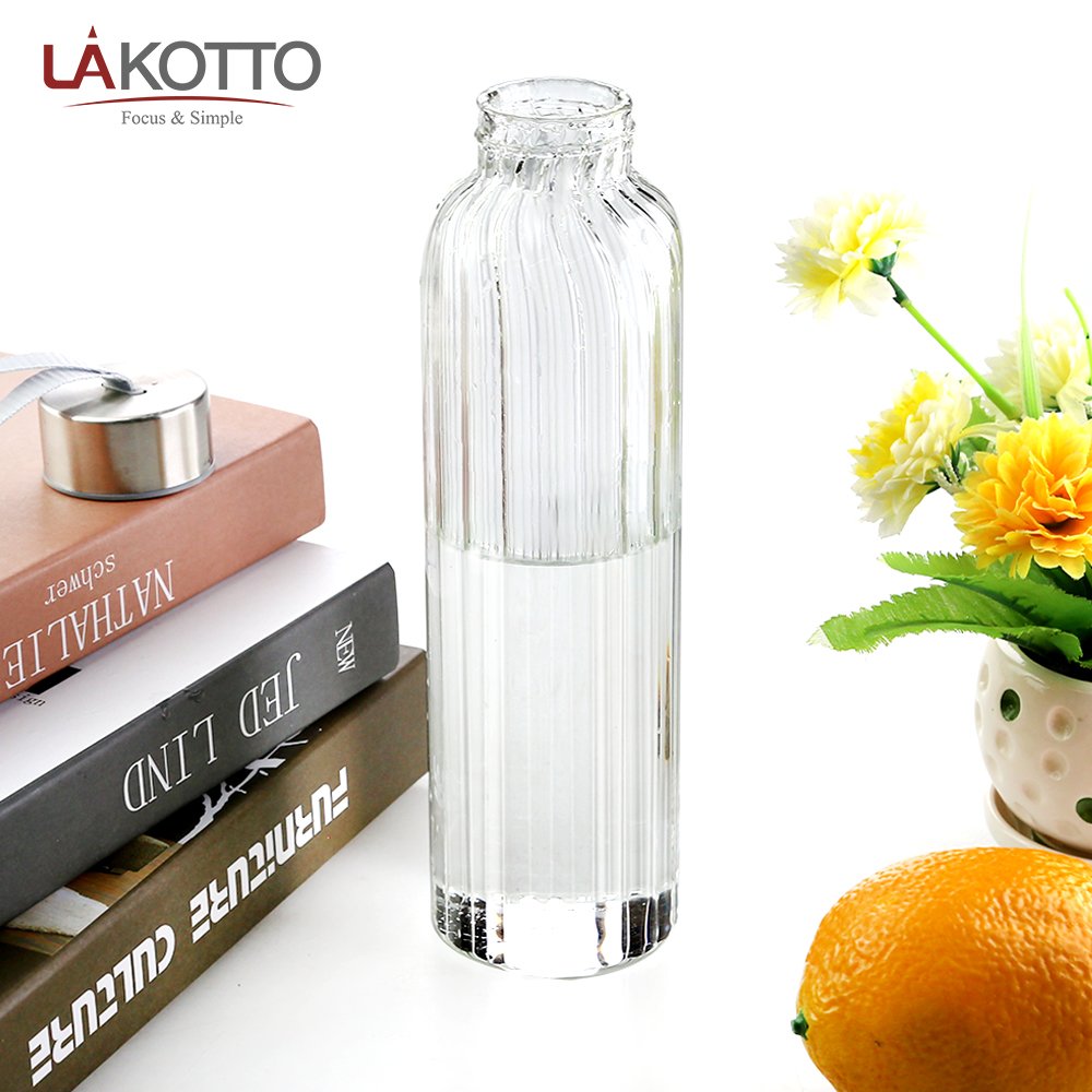 Custom logo wholesale luxury premium reusable borosilicate drinking glass water bottles with seal lid